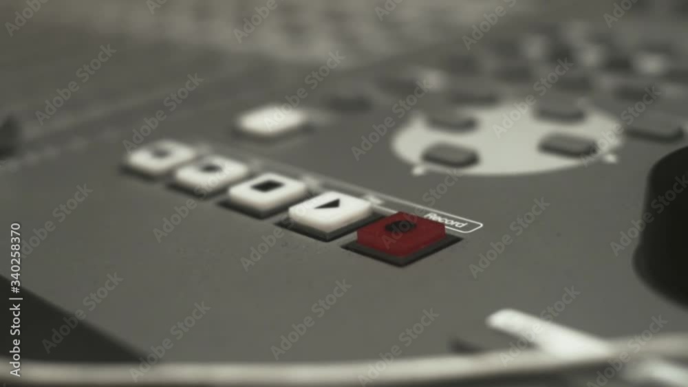 Sound mixer in a recording studio with play pause stop button Sound mixer in a recording studio with play pause stop button