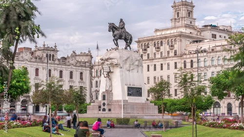 Monument to Jose de San Martin on the Plaza San Martin timelapse in Lima, Peru. Cloudy sky and historic buildings on a background photo