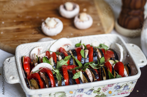 vegetarian casserole with eggplant, basil, mushrooms, tomatoes and cheese