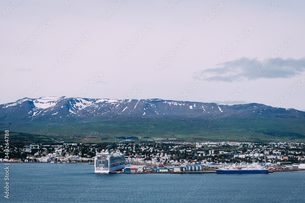 view of Akureyri the northern city of Iceland with the crisp liners standing on the pier