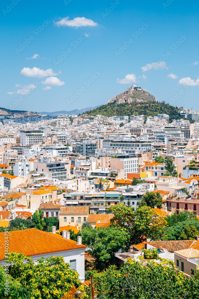 Athens cityscape and Lycabettus Hill from Plaka district hill in Athens, Greece