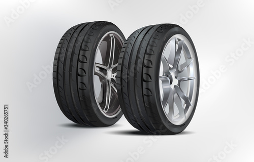 Tire set: Matte Black tubeless low profile tyre on the shiny silver drive, isolated on white background. High quality realistic wheel. High detail new 2 tyres. Car tires with different tread marks.