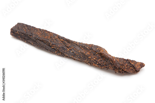 Beef Biltong, South African Beef Jerky isolated on a white studio background.