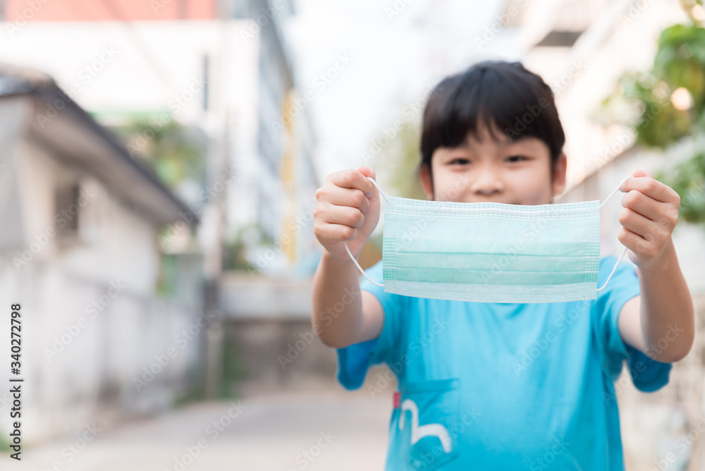 Φωτογραφία Asian Child girl wear medical face mask during pandemic Coronavirus Covid-19  outbreak