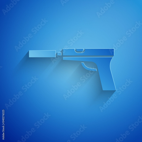 Paper cut Pistol or gun with silencer icon isolated on blue background. Paper art style. Vector Illustration