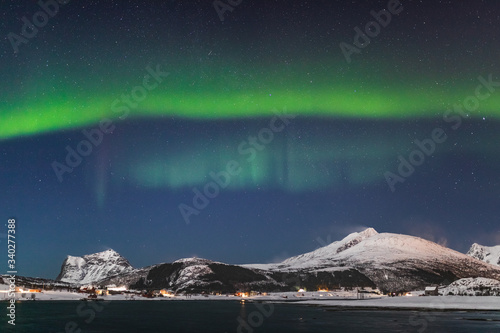 Amazing Aurora Borealis during a cold arctic night on Lofoten Islands archipelago in winter, Norway, Scandinavia