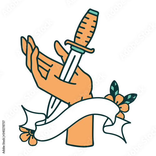 tattoo with banner of a dagger in the hand