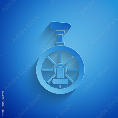 Paper cut Unicycle or one wheel bicycle icon isolated on blue background. Monowheel bicycle. Paper art style. Vector Illustration