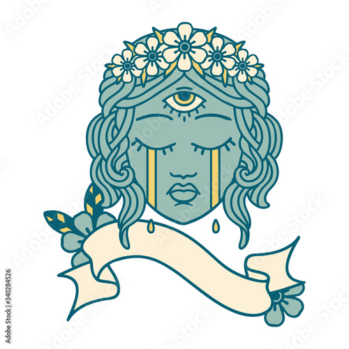 tattoo with banner of female face with third eye crying