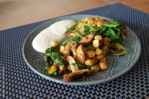 chickpeas, Shiitake mushrooms and spinach leaves with tofu and soy yoghurt dip