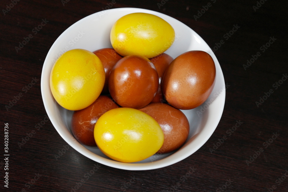 Painted eggs with turmeric and onion husks for the holiday of Bright Easter Painted eggs with turmeric and onion husks for the holiday of Bright Easter