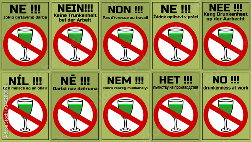 A set of posters with a prohibition sign and a glass of green liquid. The inscription No drunkenness at work in Lithuanian, German, French, Czech, Luxemburg, Irish, Latvian, Hungarian, Russian