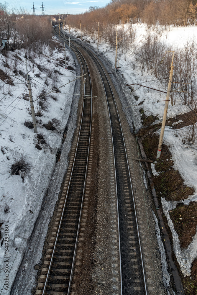 Fototapeta premium Rail road, railway tracks from railway bridge in Ufa, Russia. Railway platform. 