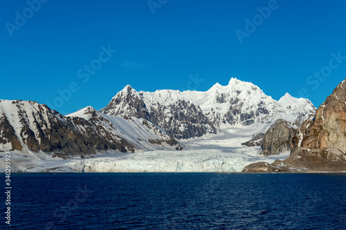 Antarctic landscape with mountains view from expedition ship  © Alexey Seafarer