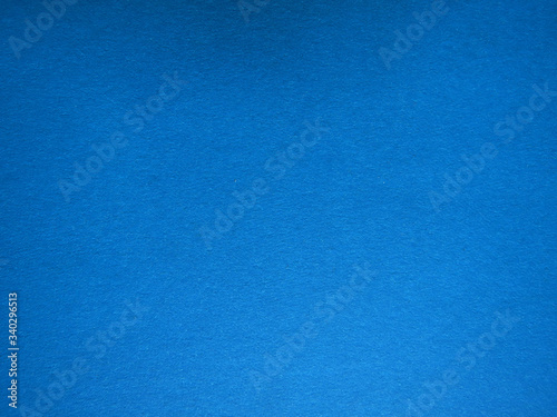 Blue paper texture. Beautiful blue background with a gradient. Illustration can be used as background or layout