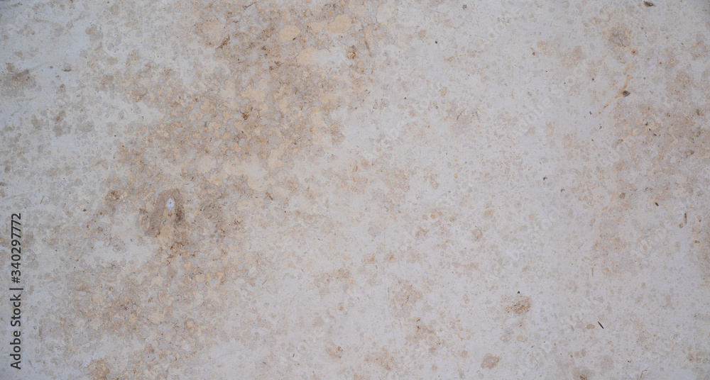 old stained travertine concrete limestone texture background with copy space old stained travertine concrete limestone texture background with copy space