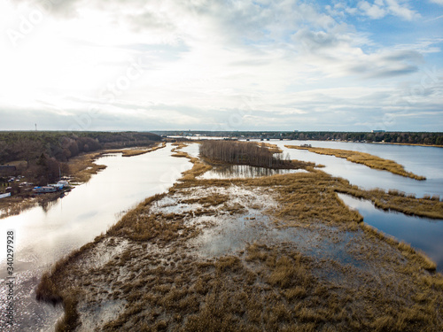 Countryside landscape areal drone photography view of river Lielupe.