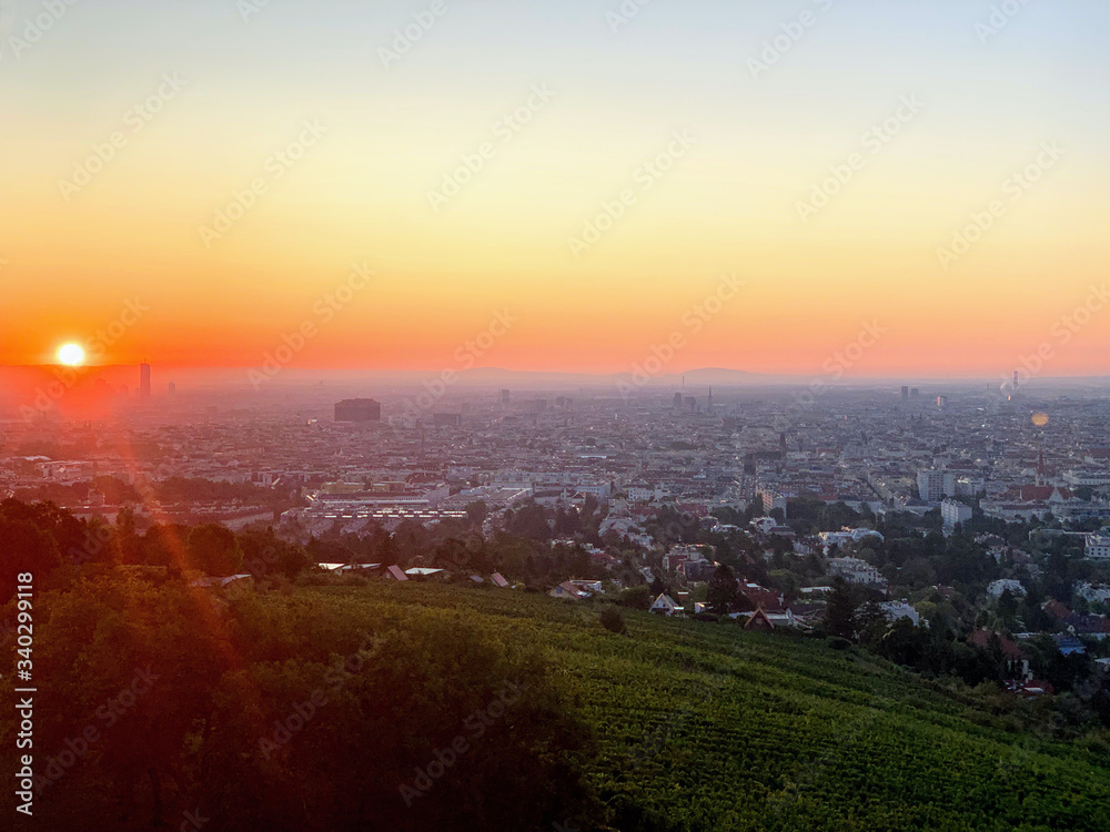 City view from a hill at sunrise