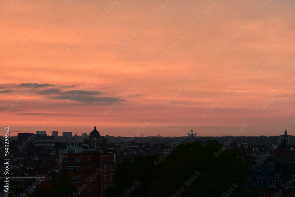 Silhouette of Brussels cityscape and Atomium during sunset