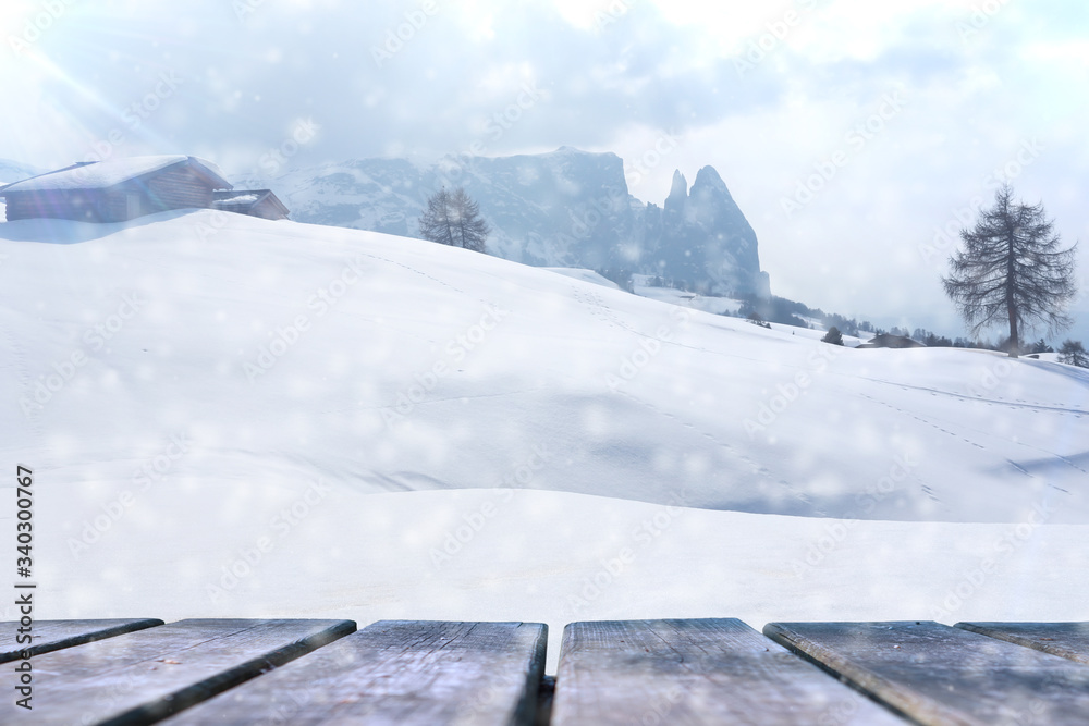 Obraz premium Empty wooden base suitable for mockup. Snow background theme.