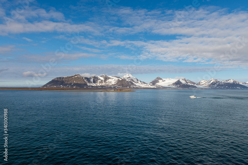 Arctic landscape with mountain and glacier in Svalbard in summer time © Alexey Seafarer