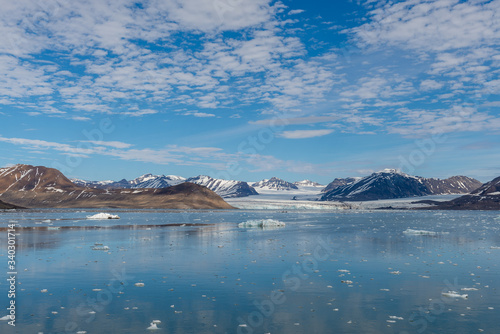 Arctic landscape with mountain and glacier in Svalbard in summer time © Alexey Seafarer