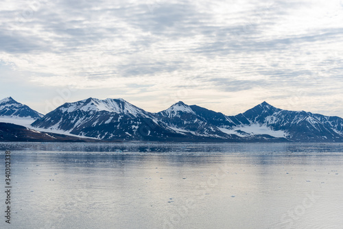 Arctic landscape with mountain and glacier in Svalbard in summer time