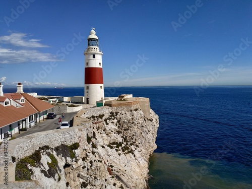 GIBRALTAR, UK - OCTOBER 21, 2019: casual view on the Gibraltar lighthouse at sun autumn day