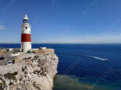 GIBRALTAR, UK - OCTOBER 21, 2019: casual view on the Gibraltar lighthouse at sun autumn day