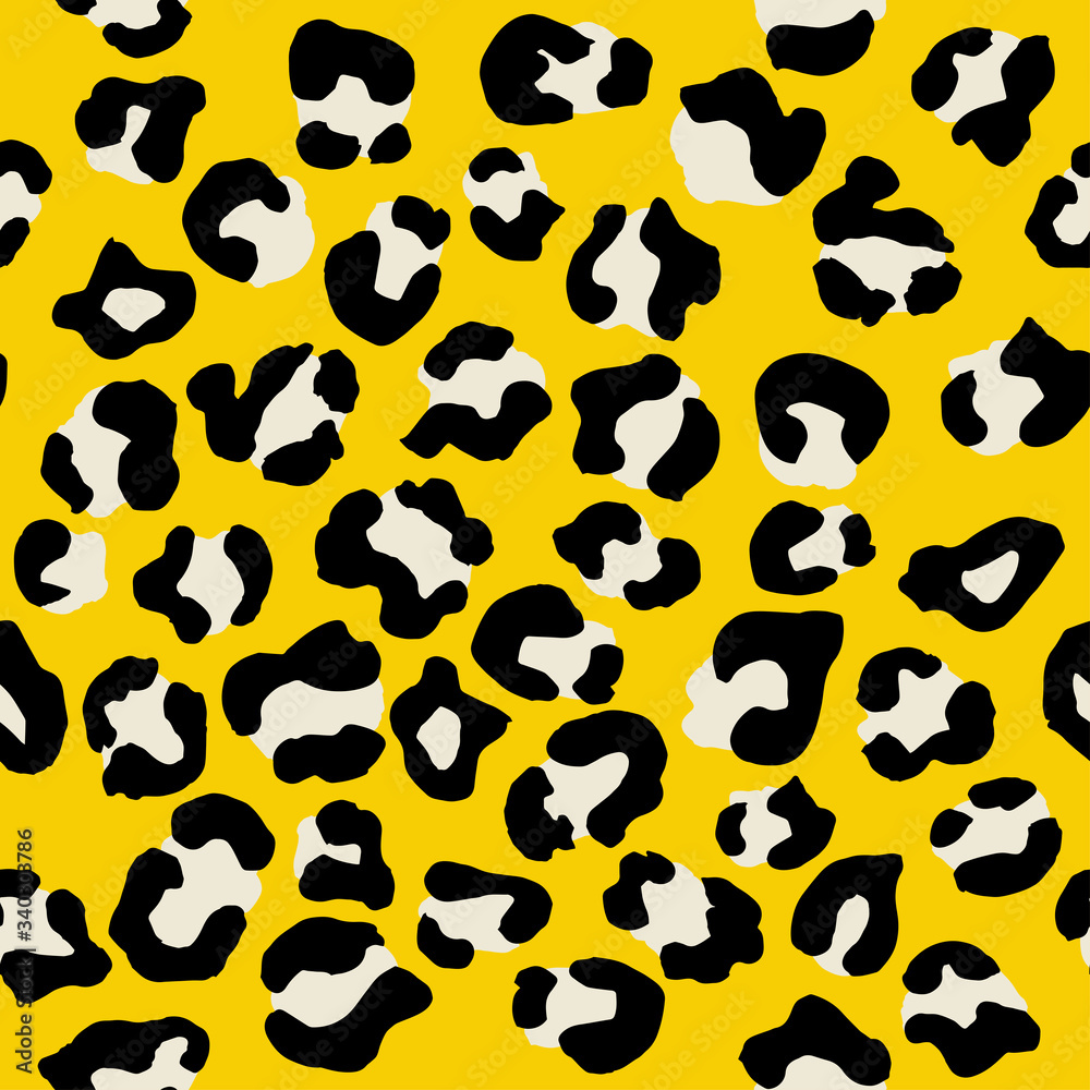 Leopard seamless pattern. Vector animal print. Black and white spots on a yellow background. Jaguar, leopard, cheetah, panther fur. Leopard skin imitation can be painted on clothes or fabric. Leopard seamless pattern. Vector animal print. Black and white spots on a yellow background. Jaguar, leopard, cheetah, panther fur. Leopard skin imitation can be painted on clothes or fabric.