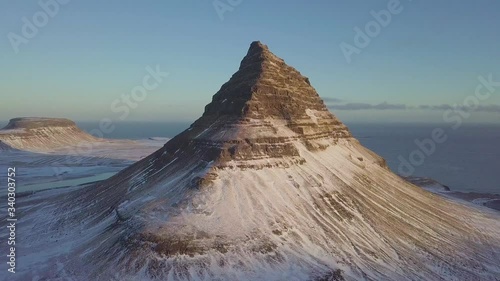 Colorful sunrise landscape view on Kirkjufell mountain. Amazing morning scene near Kirkjufell volcano, Iceland, Europe. Iceland by drone