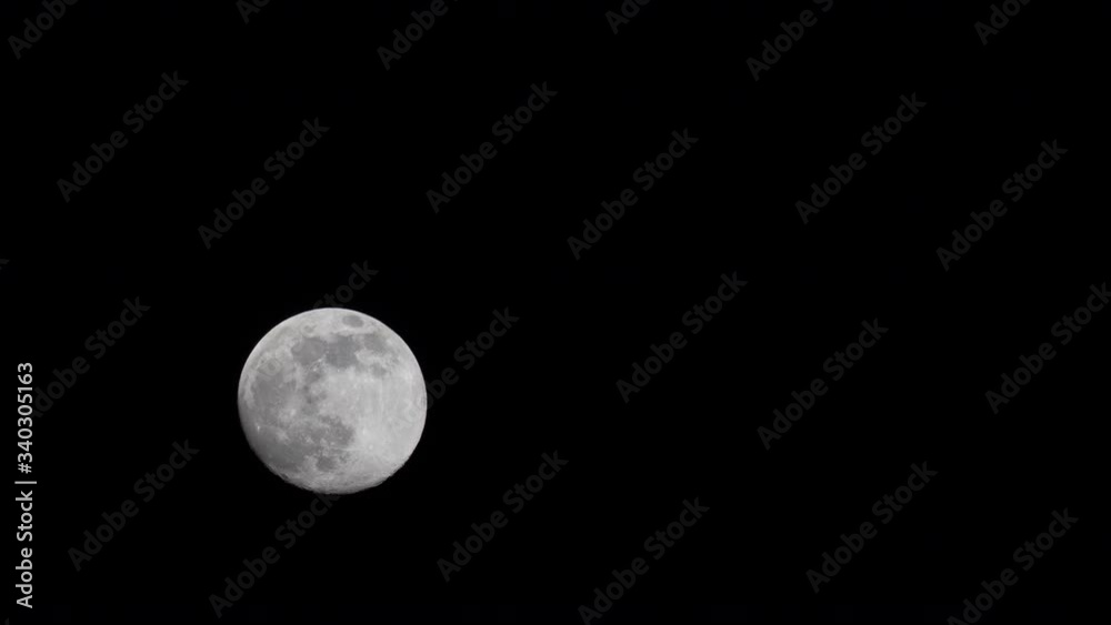 A timelapse of the Moon moving through the night sky A timelapse of the Moon moving through the night sky