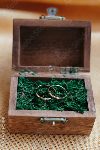 wedding rings in a wooden box