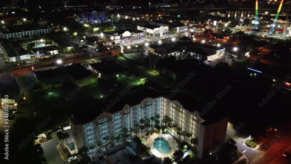 Traffic Through Luxury Hotel Resort Villa Section Of Tropical Vacation Town Drone Aerial With Pam Trees Traffic Through Luxury Hotel Resort Villa Section Of Tropical Vacation Town Drone Aerial With Pam Trees
