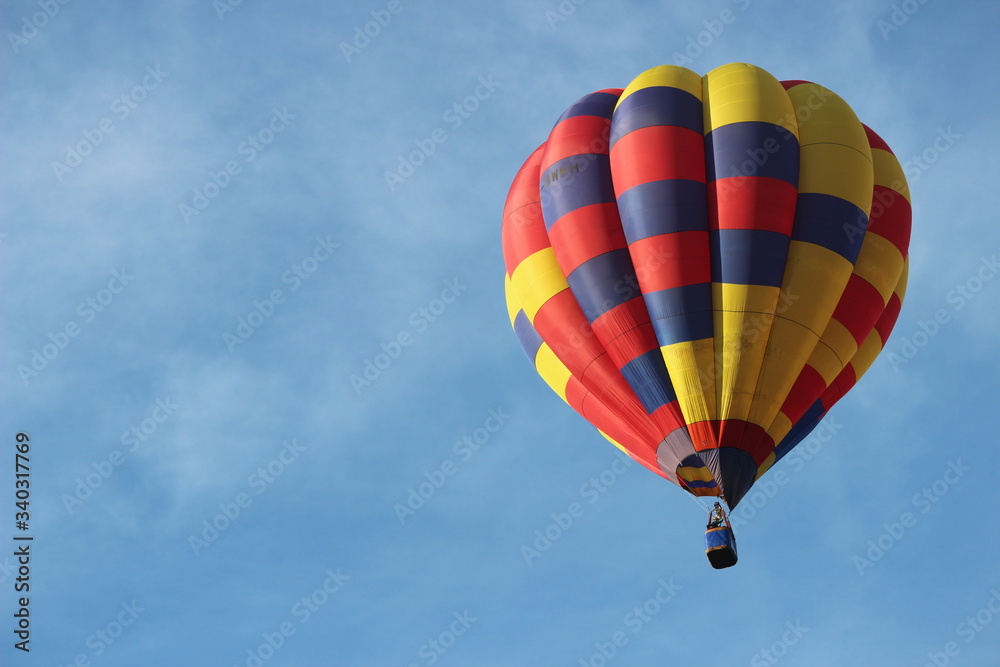 Multi Coloured Hot Air Balloon In Flight Close Up Multi Coloured Hot Air Balloon In Flight Close Up
