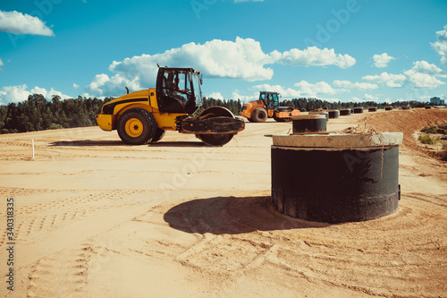 Steamroller is working on road construction