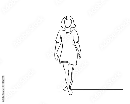 One continuous line drawing. Standing woman vector