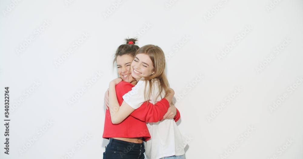 girls in summer clothes showing positive emotions girls in summer clothes showing positive emotions