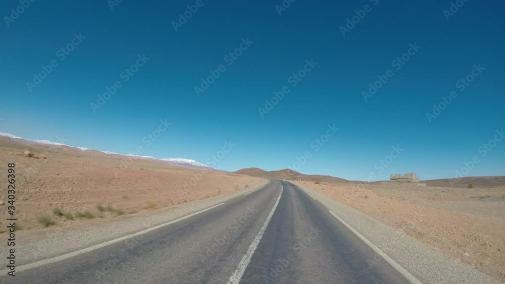 POV Camera car on empty mountain road. Atlas mountain path in Morocco POV Camera car on empty mountain road. Atlas mountain path in Morocco