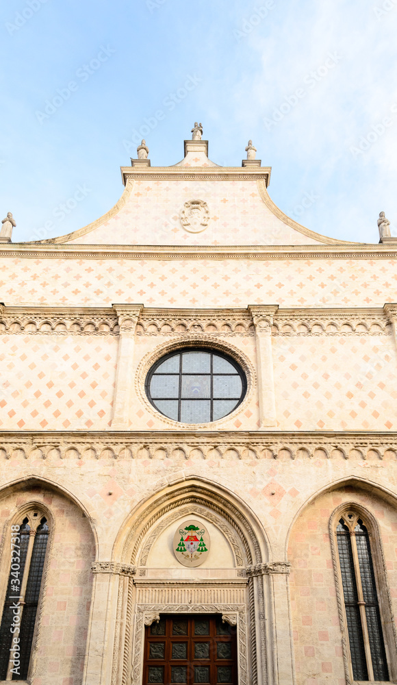 Obraz premium The Santa Maria Annunciata church, the Duomo of Vicenza, Italy. Here a detail of the highly decorated white and pink marble facade