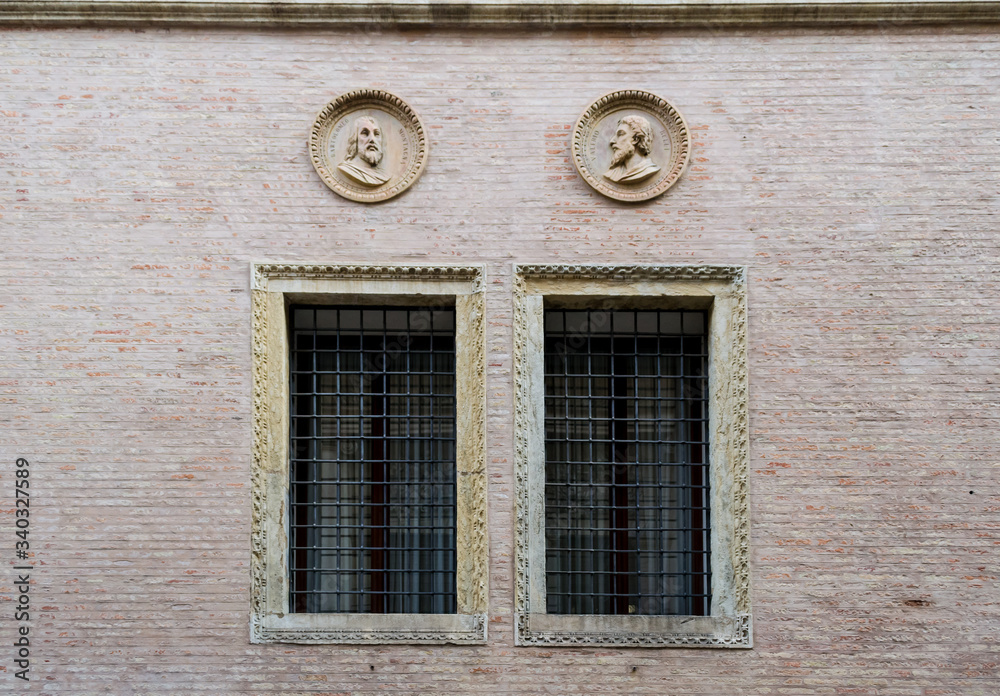 Vicenza, Italy. A nice couple of window in a brick wall of one the the many beautiful palaces of this interesting town