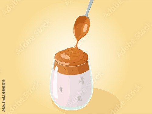 Dalgona coffee is a fluffy drink made by whipping in equal proportions instant coffee, sugar and hot water until it becomes creamy, and then adding it to cold or hot milk. Colored Vector Illustration.