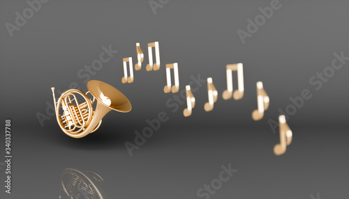 Golden French horn on a black background