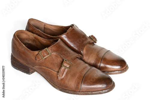 Brown leather shoes isolated on white background.