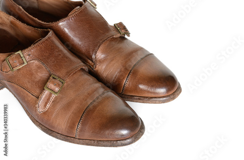 Brown leather shoes isolated on white background.