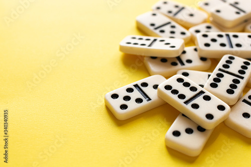domino pieces on the yellow background