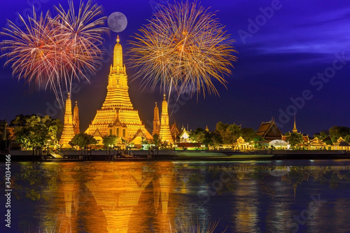 Photography Firework countdown celebration display over temple of dawn on the Chao Praya riverside