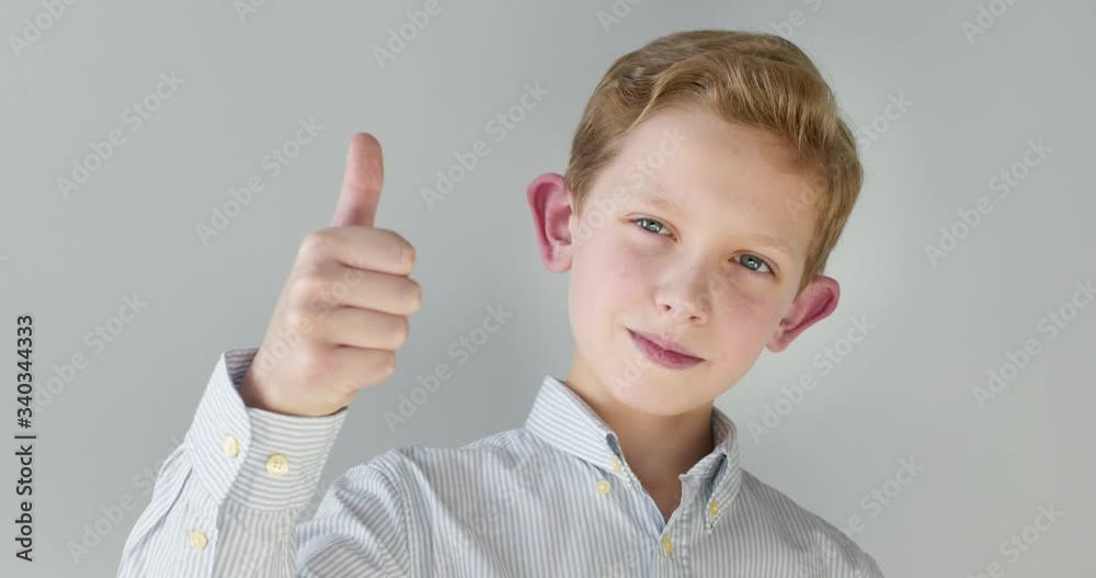 Close-up portrait. A boy is showing Close-up portrait. A boy is showing