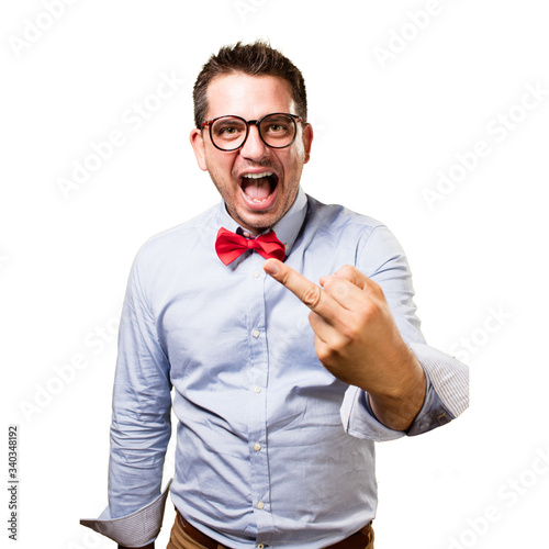 Man wearing a red bow tie. Rocker gesture.