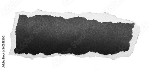 Black blank and empty cardboard scrap, piece isolated on white background, clipping path